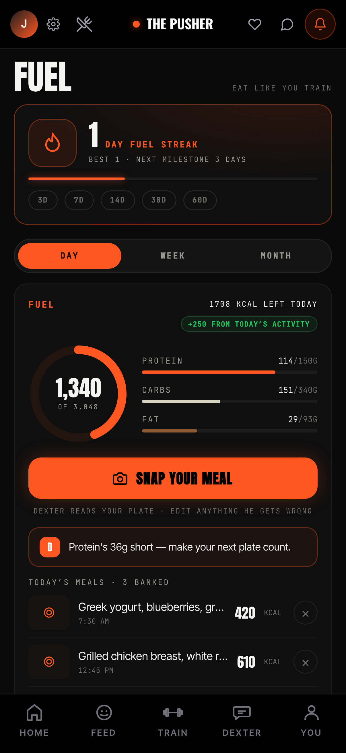 The Pusher Fuel tab: a logged meal with calories and macros, and the day's calorie ring